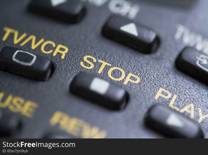 A close up of the stop button on a remote control.