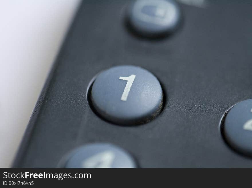 Close up of number one on a remote control button. Close up of number one on a remote control button