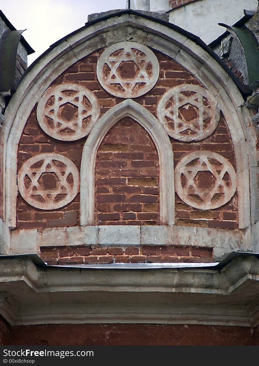 Old window in a wall of a church. Old window in a wall of a church