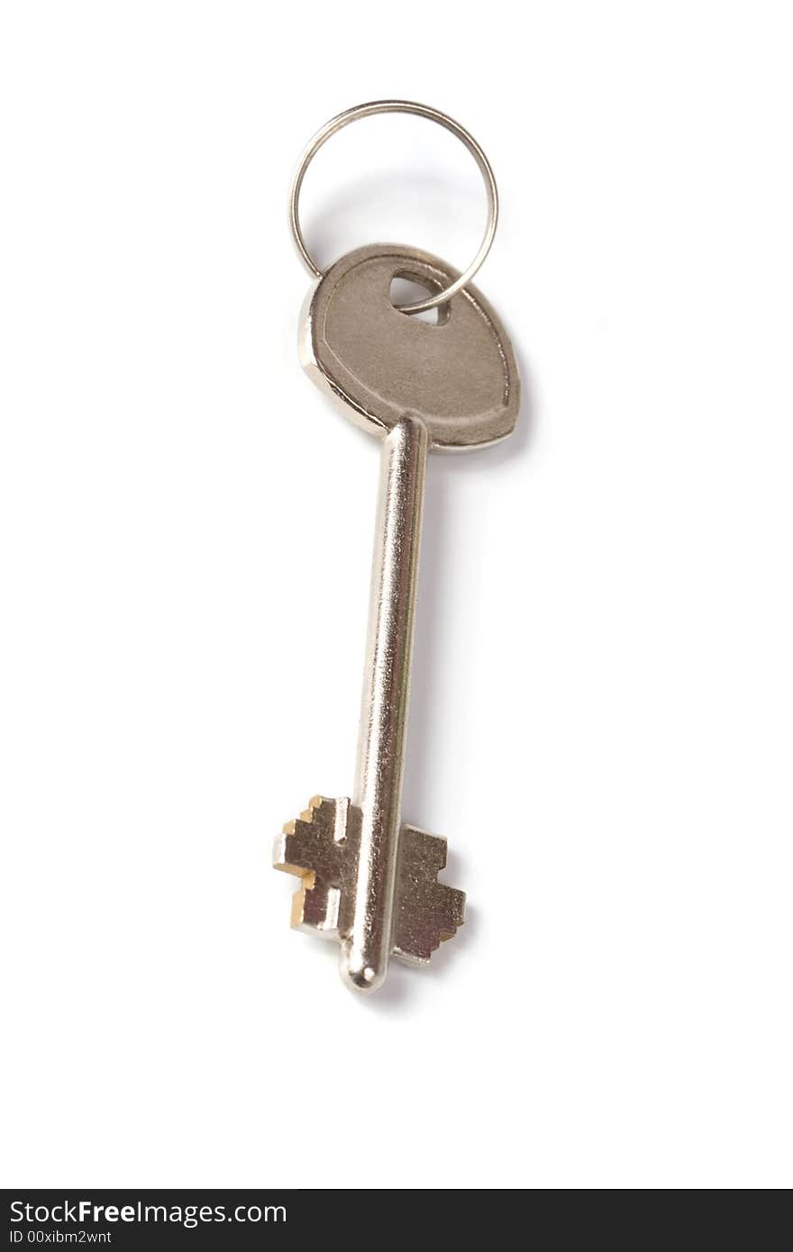 Large metal key with ring. Isolated on a white background.