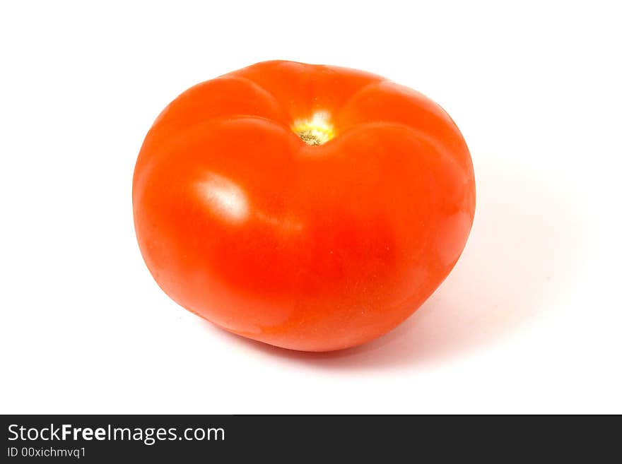 Photo of the tomato in the isolate. Photo of the tomato in the isolate