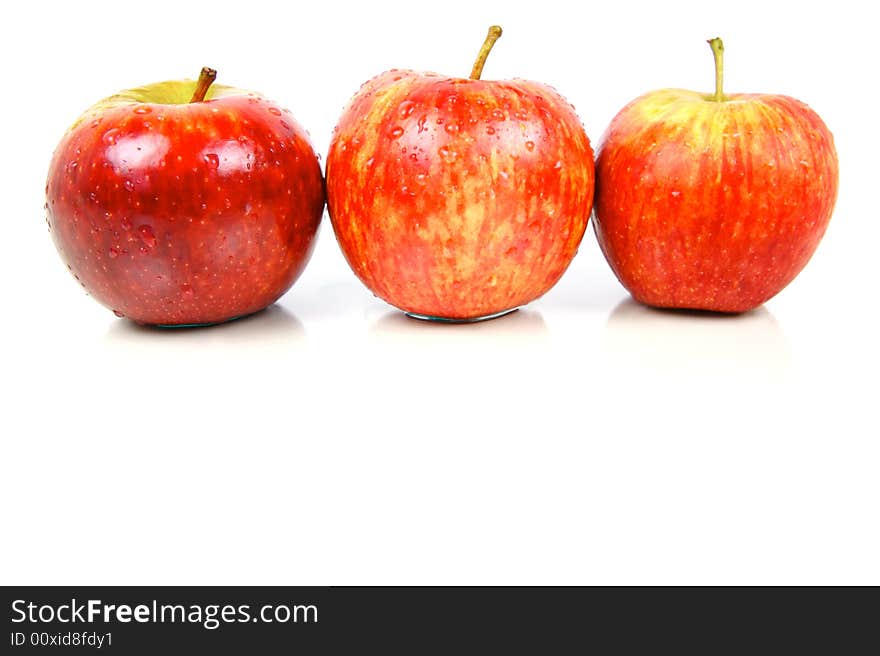 Red apples isolated against a white background