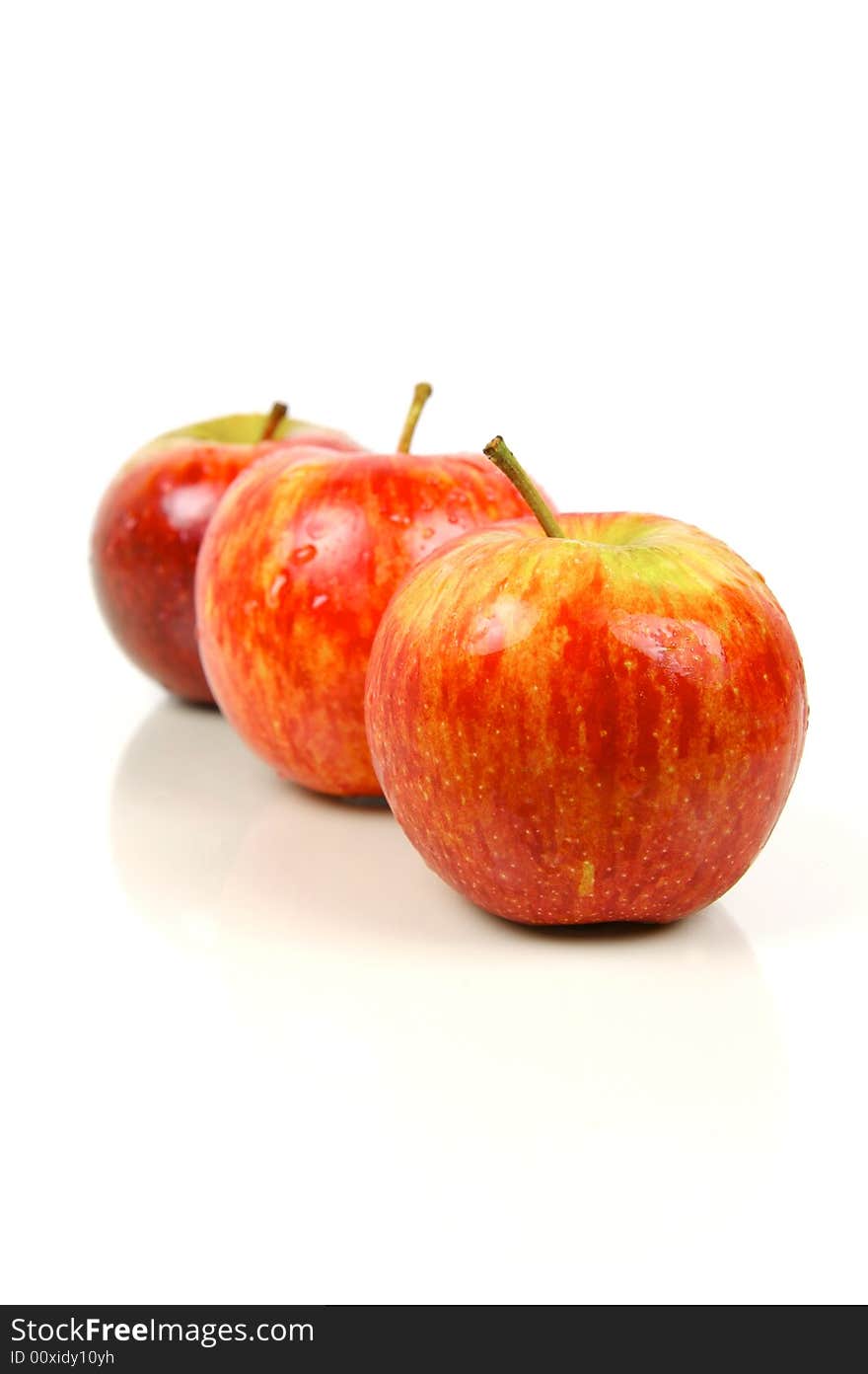 Red apples isolated against a white background