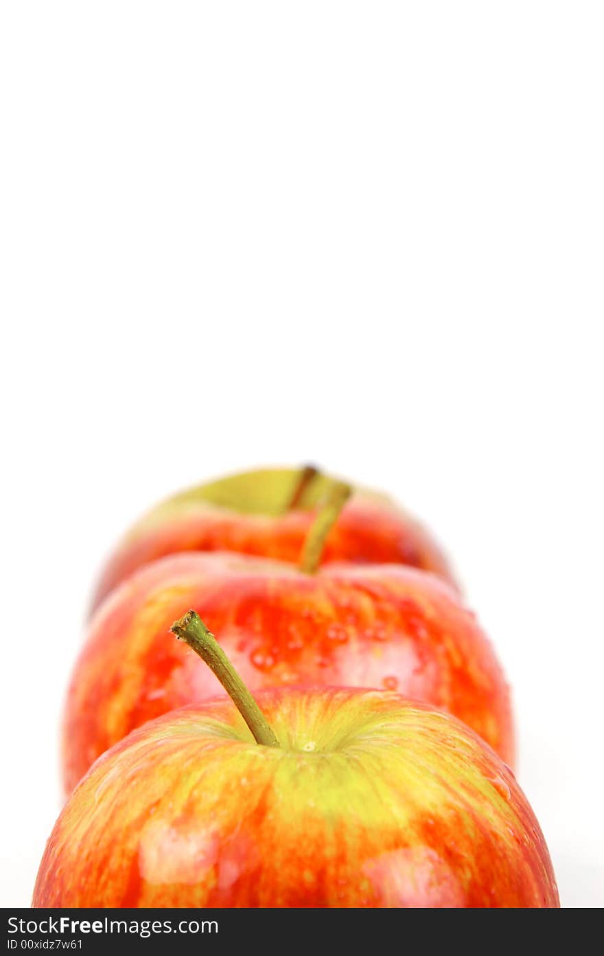 Red apples isolated against a white background