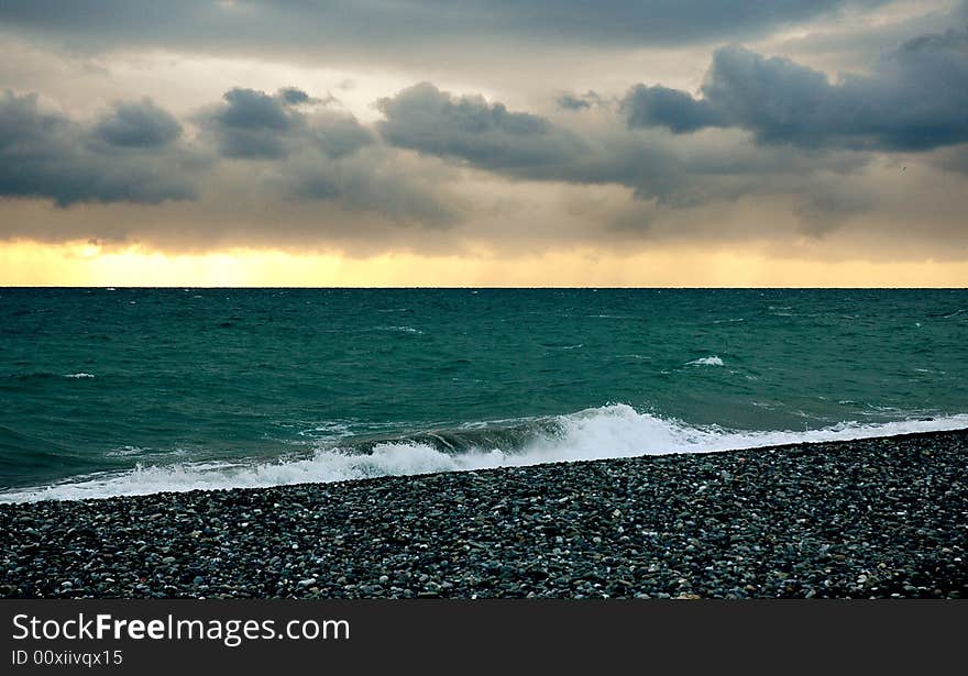 Sunset on the sea before a storm