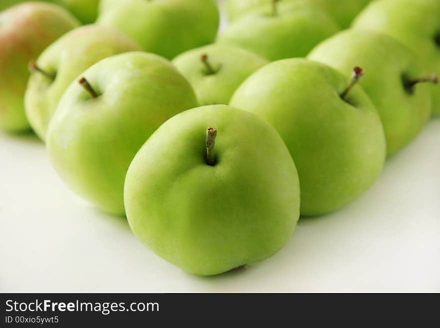 Green apples on a white background. Green apples on a white background.