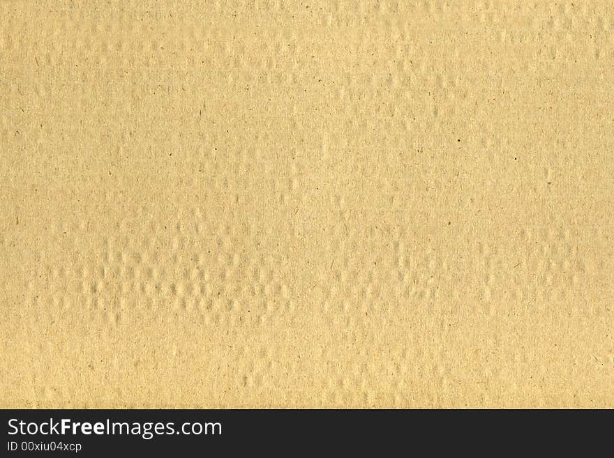 Closeup of a brown cardboard surface background