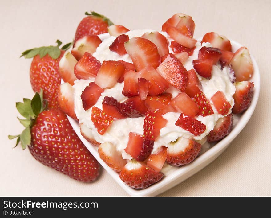 Dessert from a strawberry with a cream. Dessert from a strawberry with a cream.