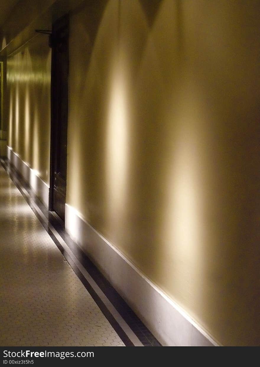 A dramatically lit, quiet hallway upstairs in Kansas City's Union Station, which is on the National Register of Historic Places