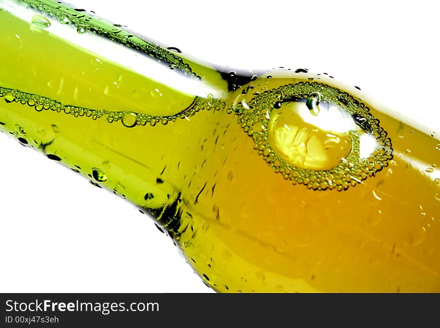 Bottle of beer closeup on white background