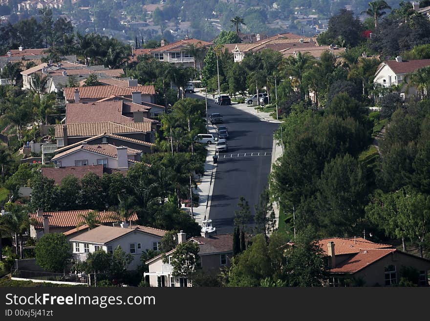 Houses crowded together and their red-tiled roofs. Houses crowded together and their red-tiled roofs.