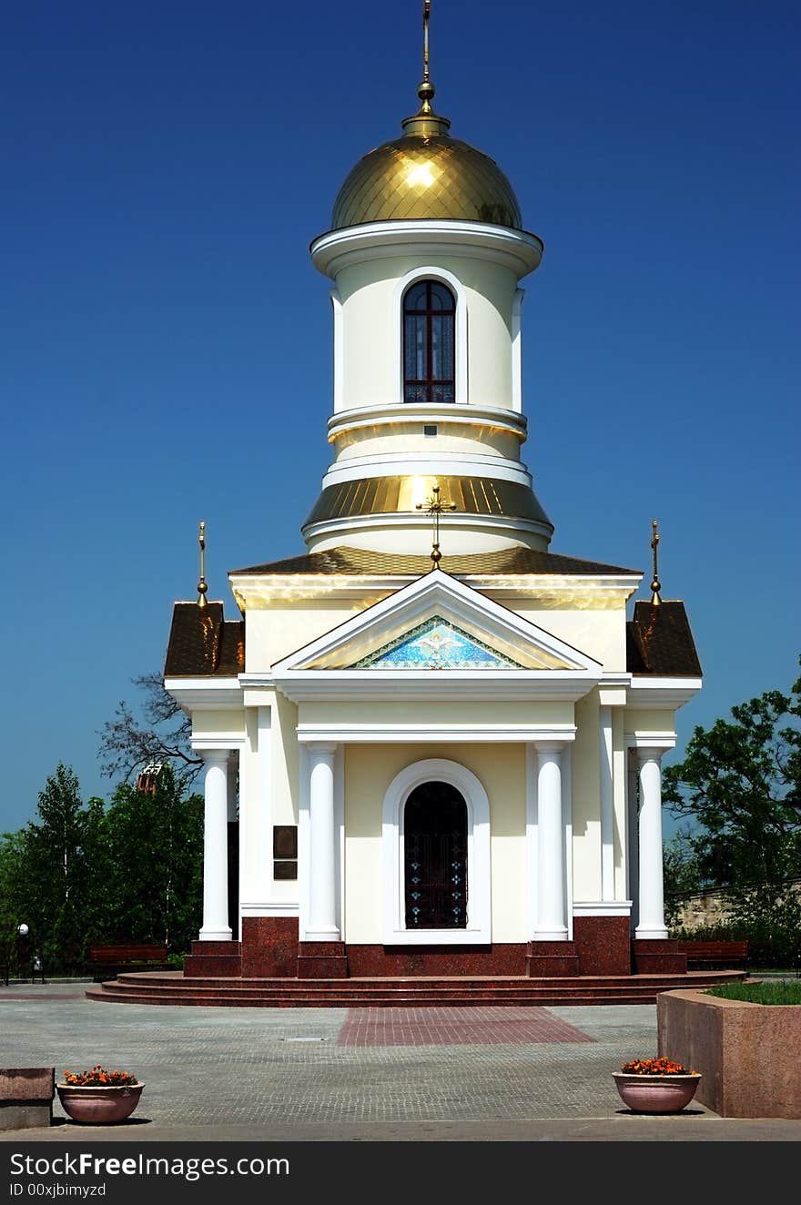 Small church over clear blue sky