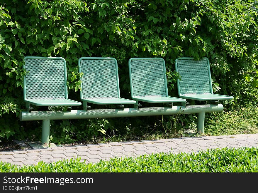 Green bench in Poland park