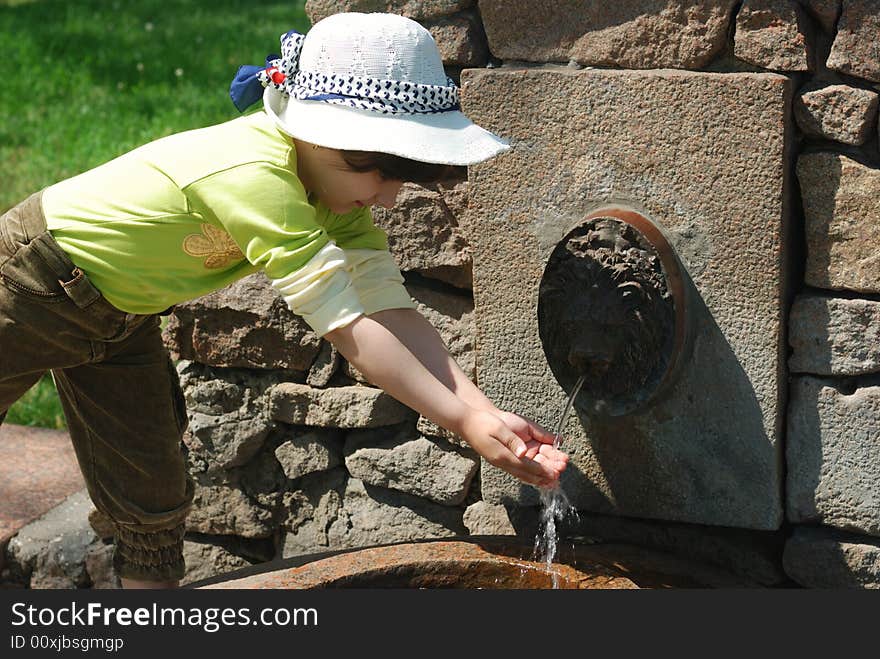 Child And Fresh Water