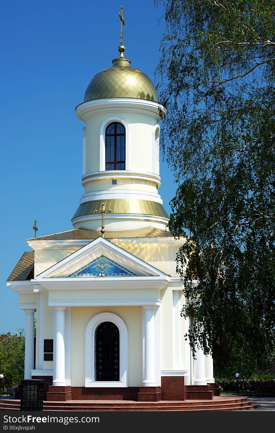 Small church over clear blue sky