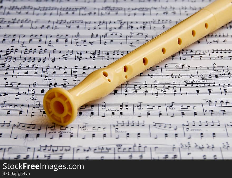 Flute On A Music Sheet