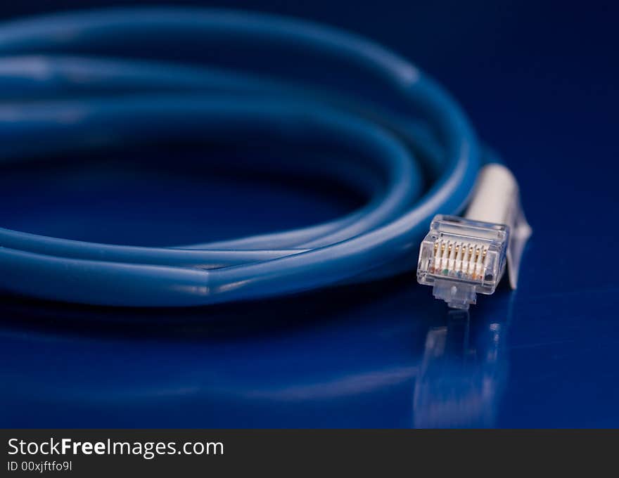 Network Cable isolated on a blue background