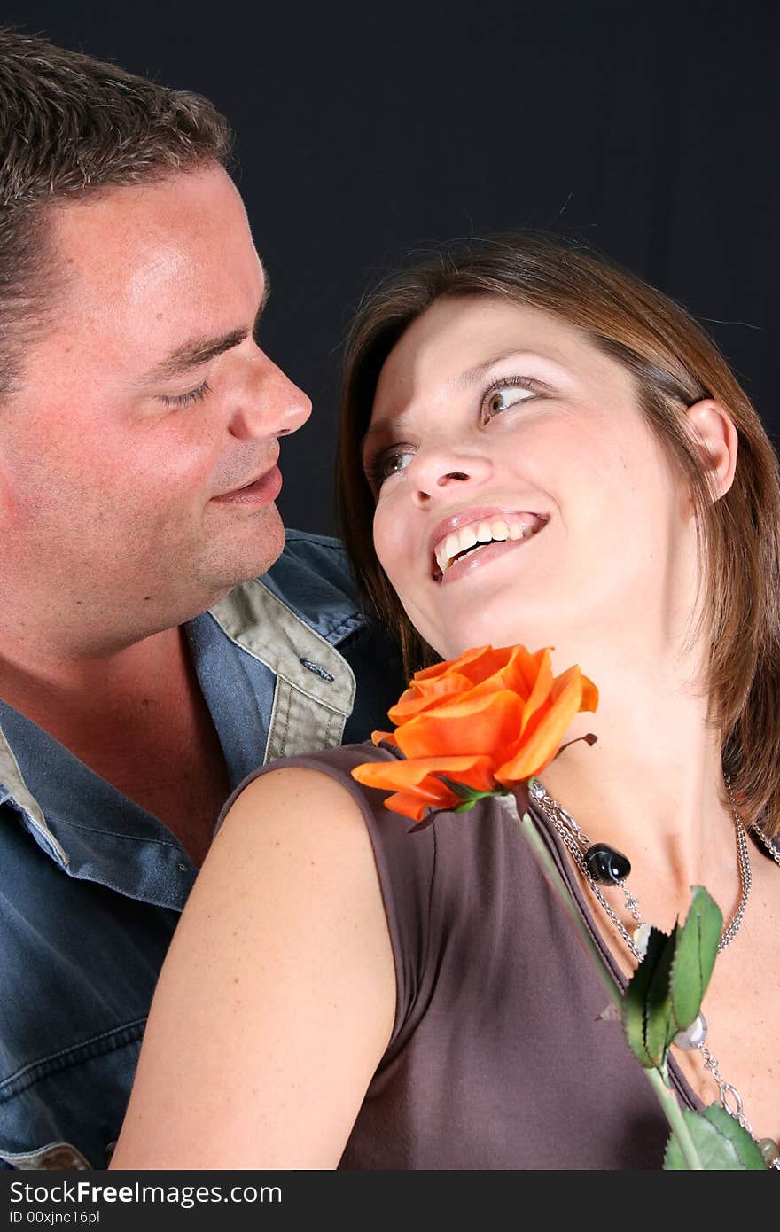 Young couple in love, looking at one another