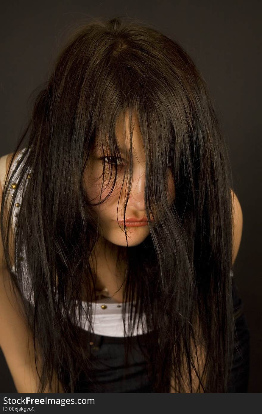 Sensual girl looking in camera isolated in studio