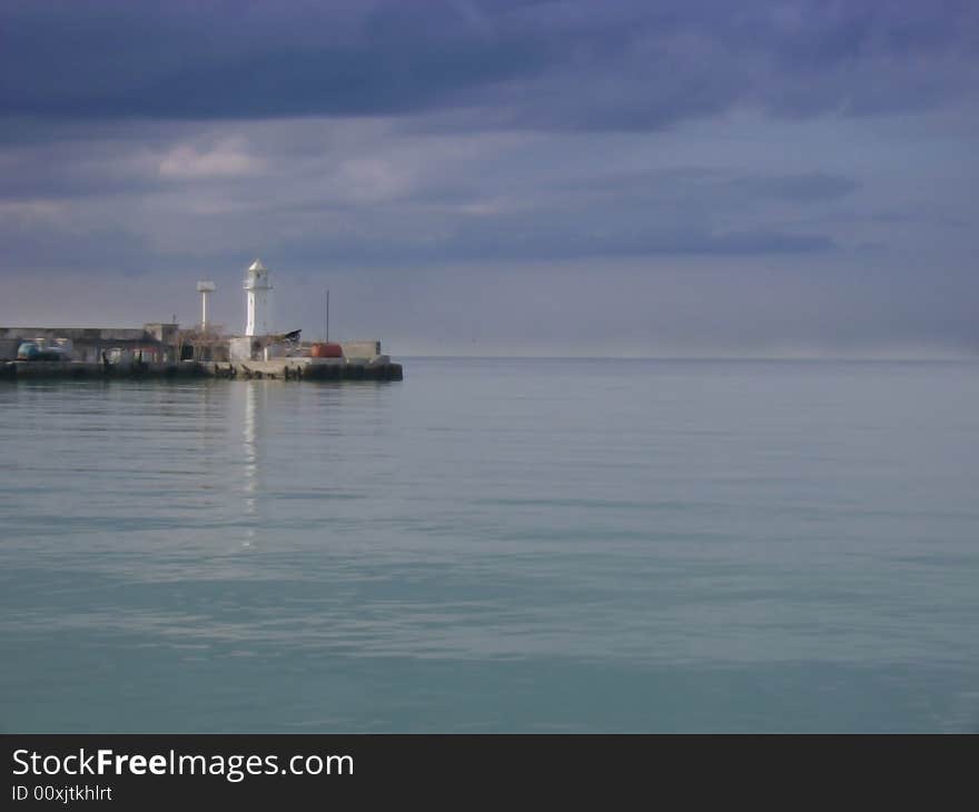 Sky under the sea and lighthouse. Sky under the sea and lighthouse