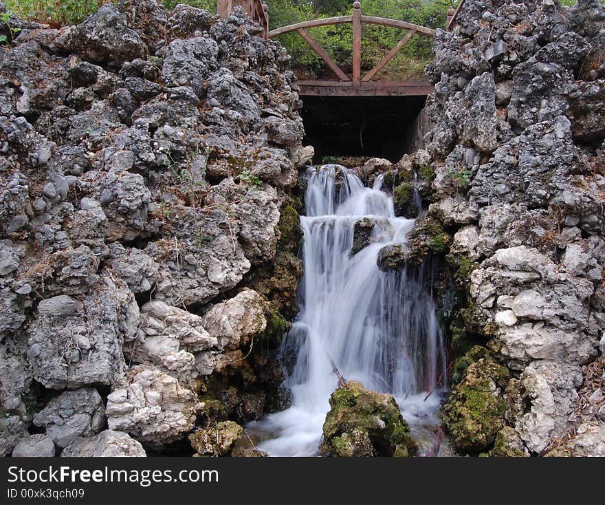 At the entrance of black dargen lake there is a little waterfall and a bridge. At the entrance of black dargen lake there is a little waterfall and a bridge