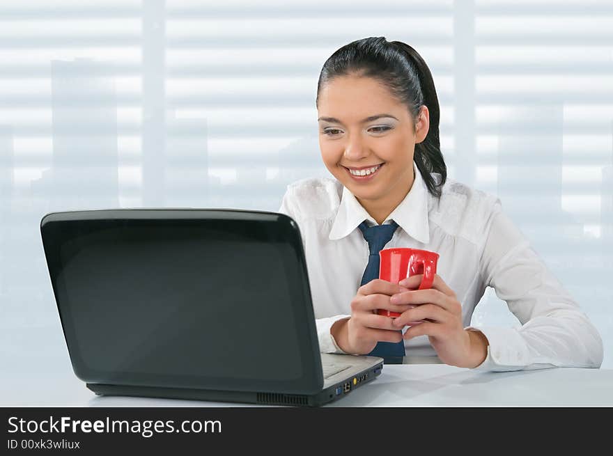 Woman looks at her notebook