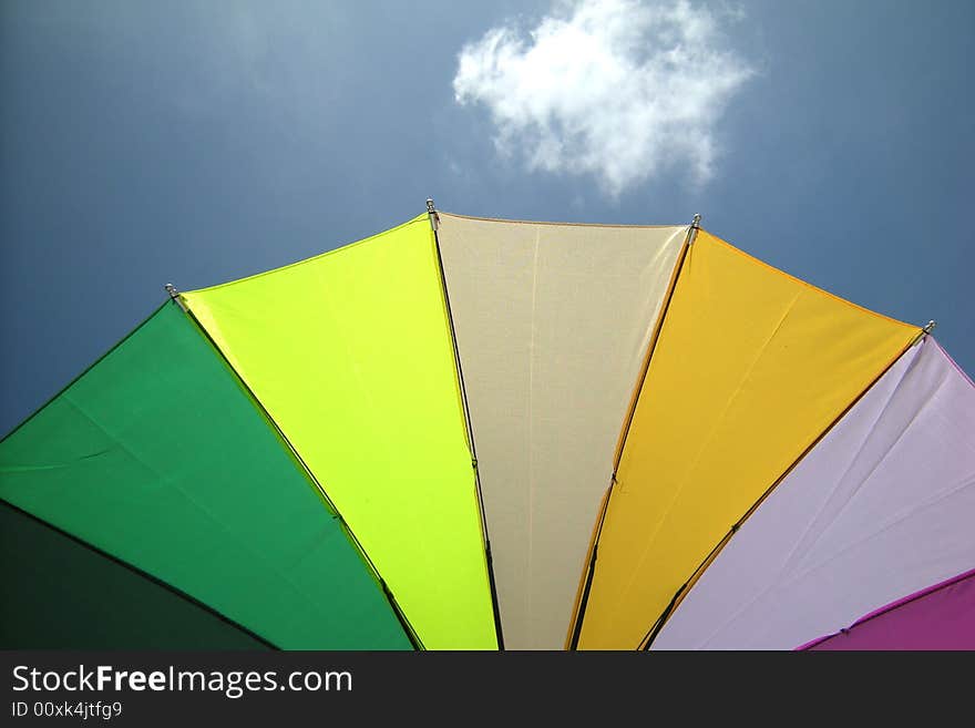 Umbrella and blue sky - spring. Umbrella and blue sky - spring