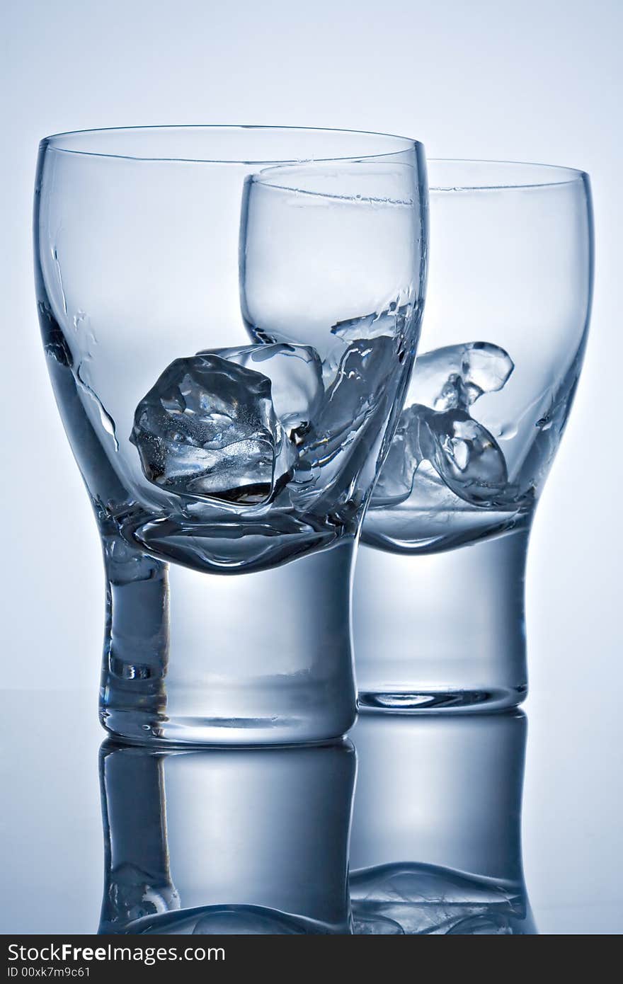 Two glasses with ice