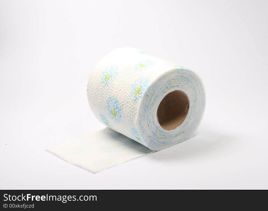 A paper toilet white rolled. A paper toilet white rolled