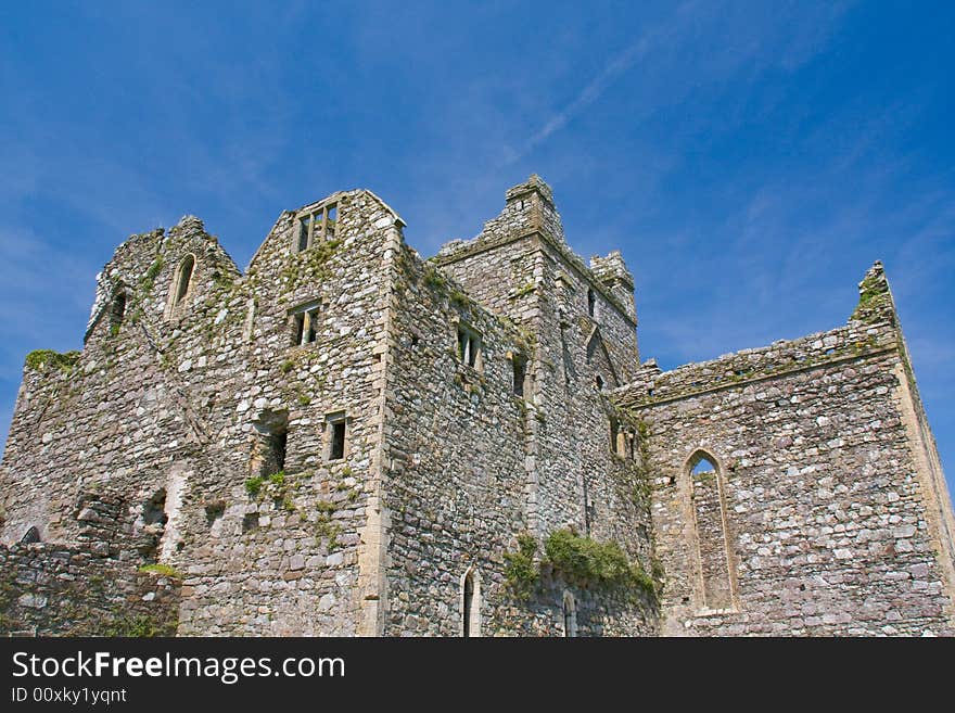 Ruins of an old abbey against a striking blue sky. Ruins of an old abbey against a striking blue sky