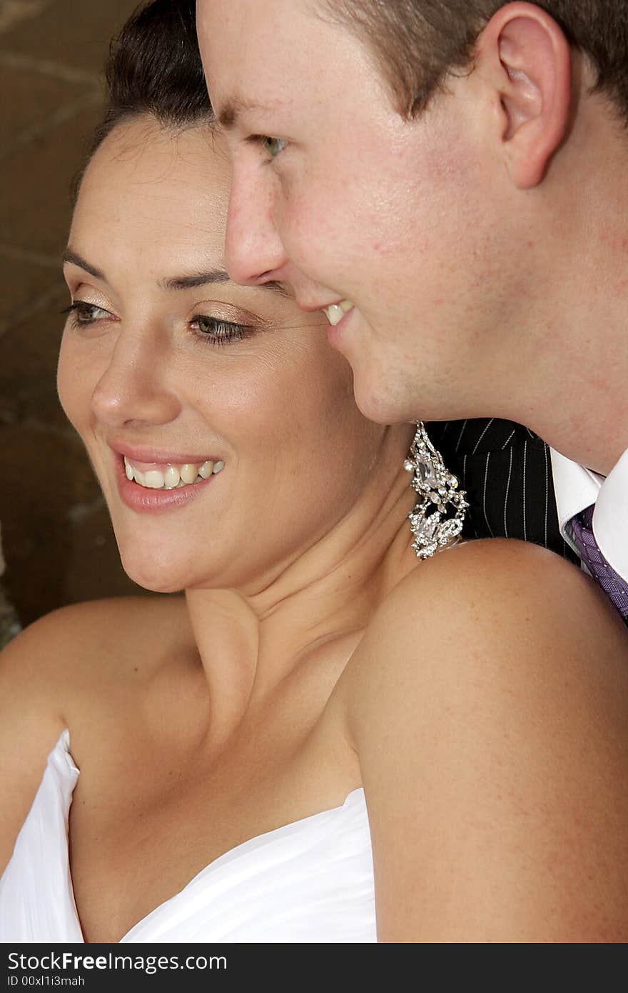 A bride and groom on their wedding day. A bride and groom on their wedding day