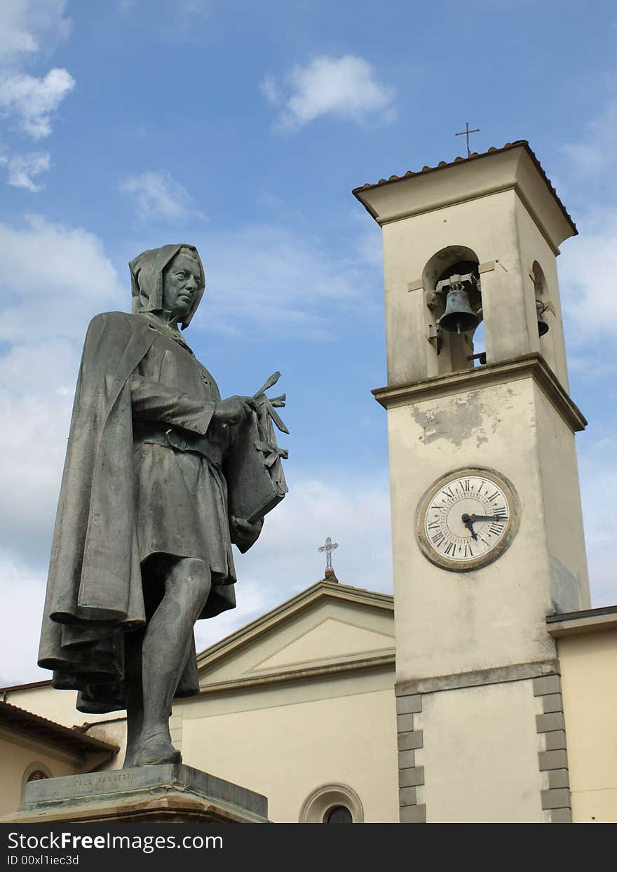 A beautifull view of the statue of Giotto and the bell's tower of the church in Vicchio'square, Tuscany. A beautifull view of the statue of Giotto and the bell's tower of the church in Vicchio'square, Tuscany