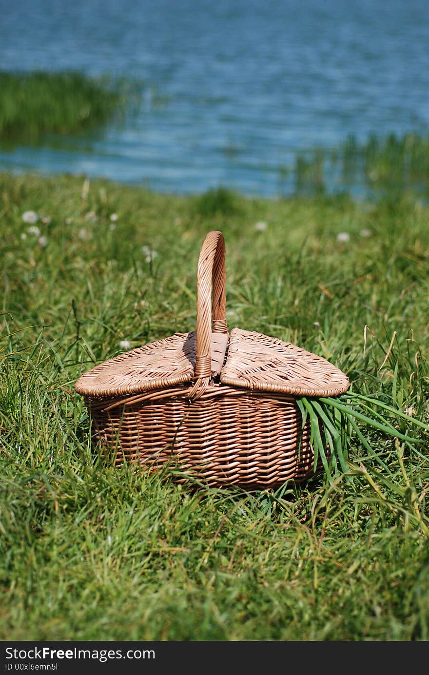 Lunch on the grass close by lake. Lunch on the grass close by lake