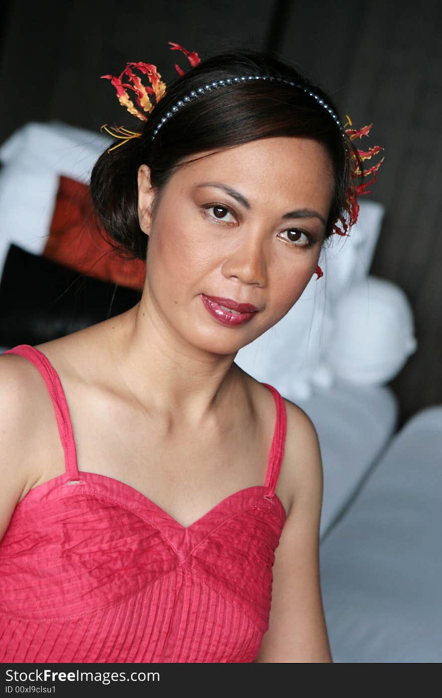 Close-up portrait of an attractive Thai woman.