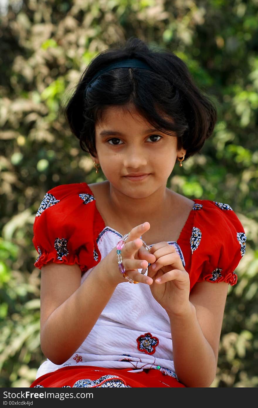 A girl fond of wearing hand bracelet. A girl fond of wearing hand bracelet.