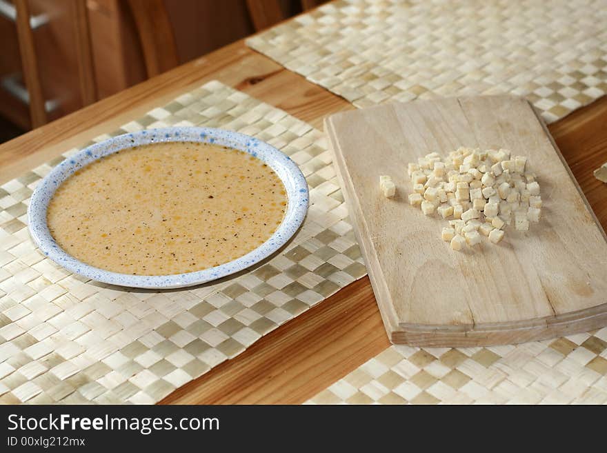 Cheese soup with some croutons