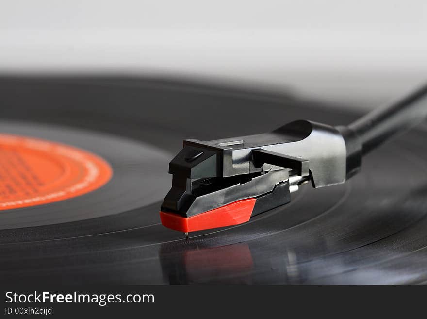 Close up of a record players needle.