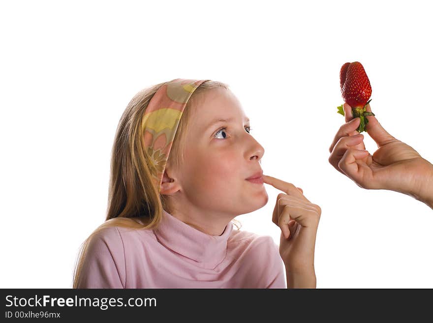 Young girl and hand with strawberry. Young girl and hand with strawberry