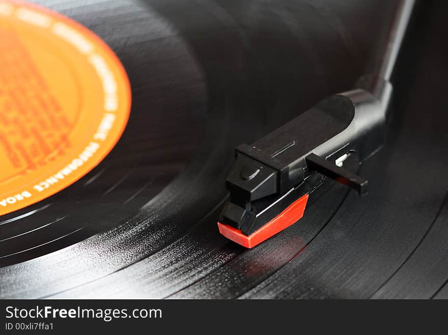 Close up of a record players needle.