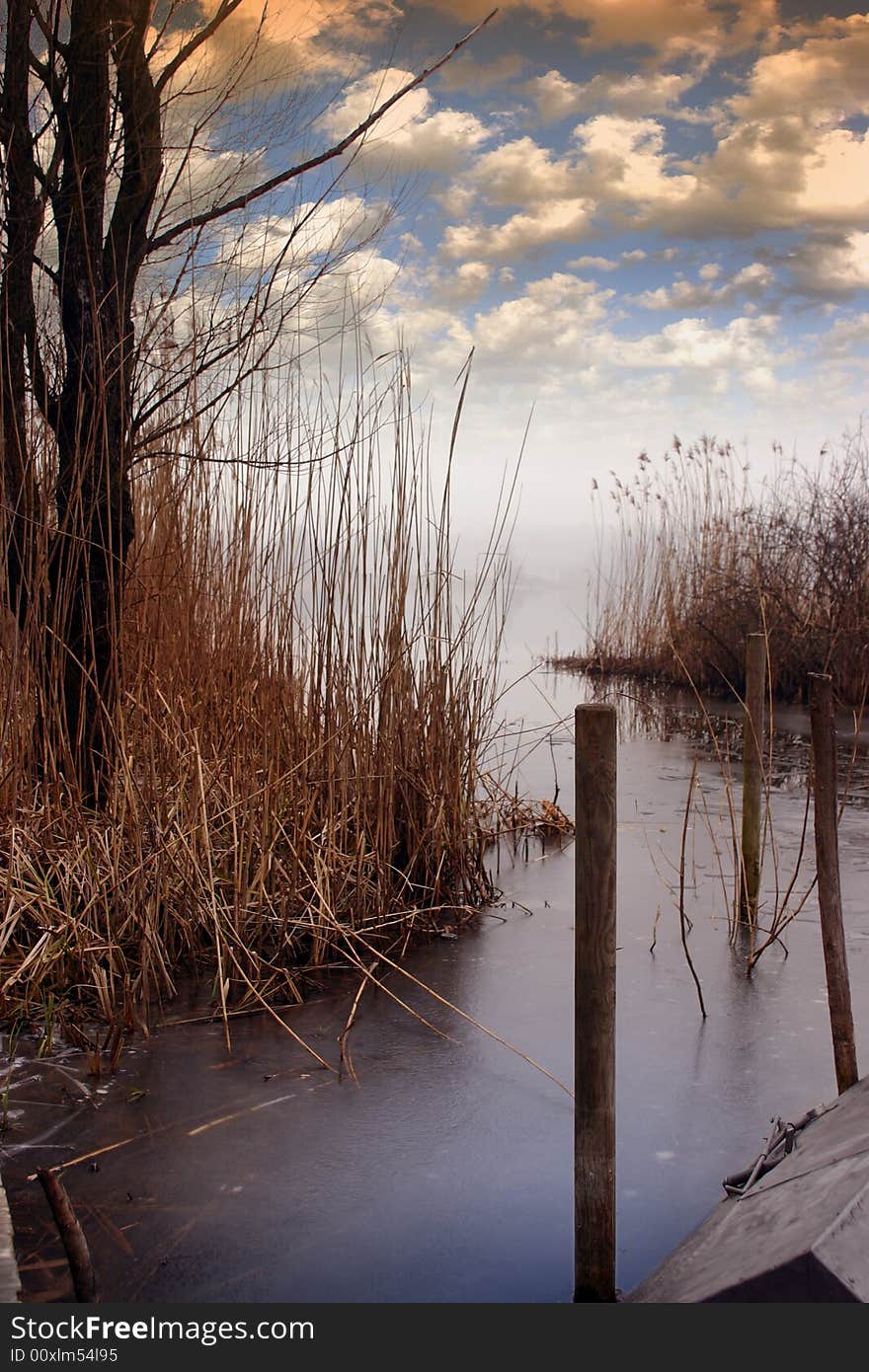 Frozen lake in winter with blue sky. Frozen lake in winter with blue sky