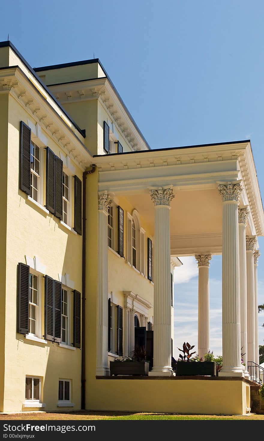 A view of elaborate woodwork and high columns on the porch and entryway to the mansion at Oatlands Plantation, Leesburg, Virginia. A view of elaborate woodwork and high columns on the porch and entryway to the mansion at Oatlands Plantation, Leesburg, Virginia.