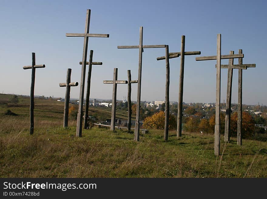 Group of crosses on a hill of blue sky