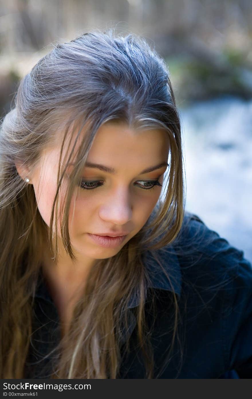 Portrait of young girl on forest background