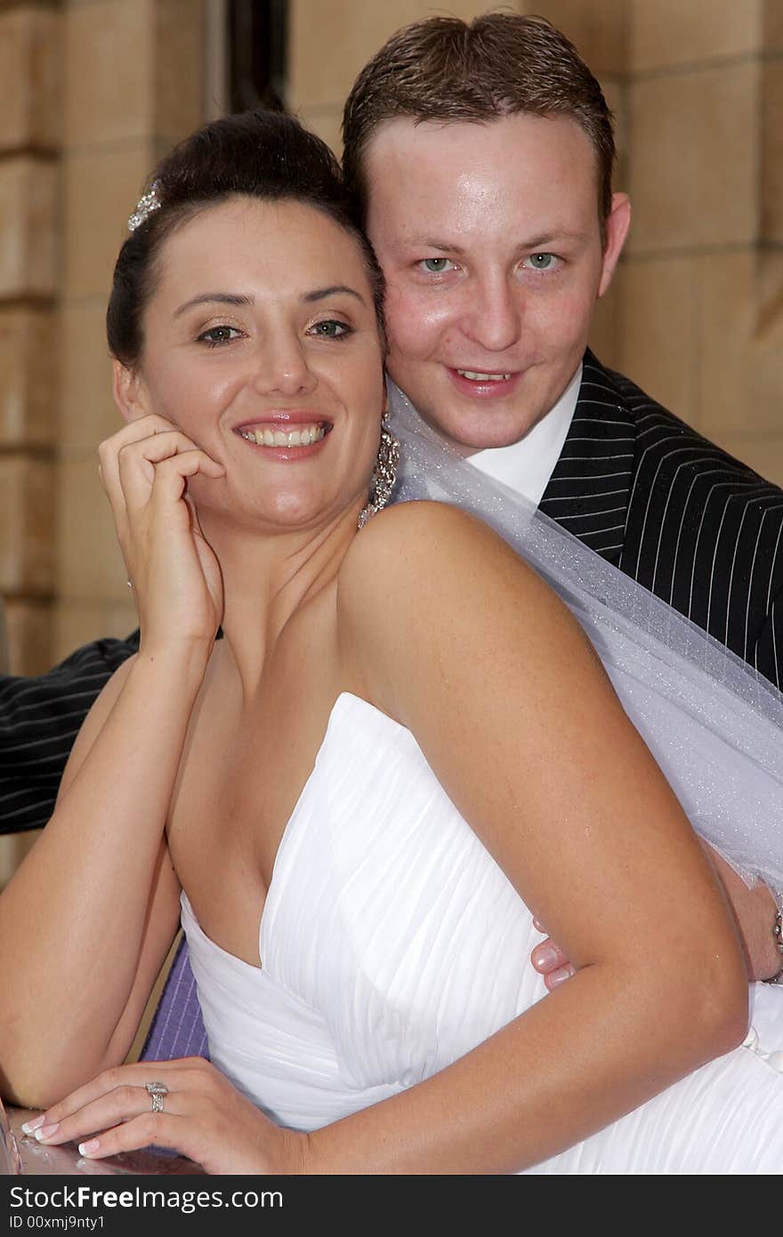 A bride and groom on their wedding day. A bride and groom on their wedding day