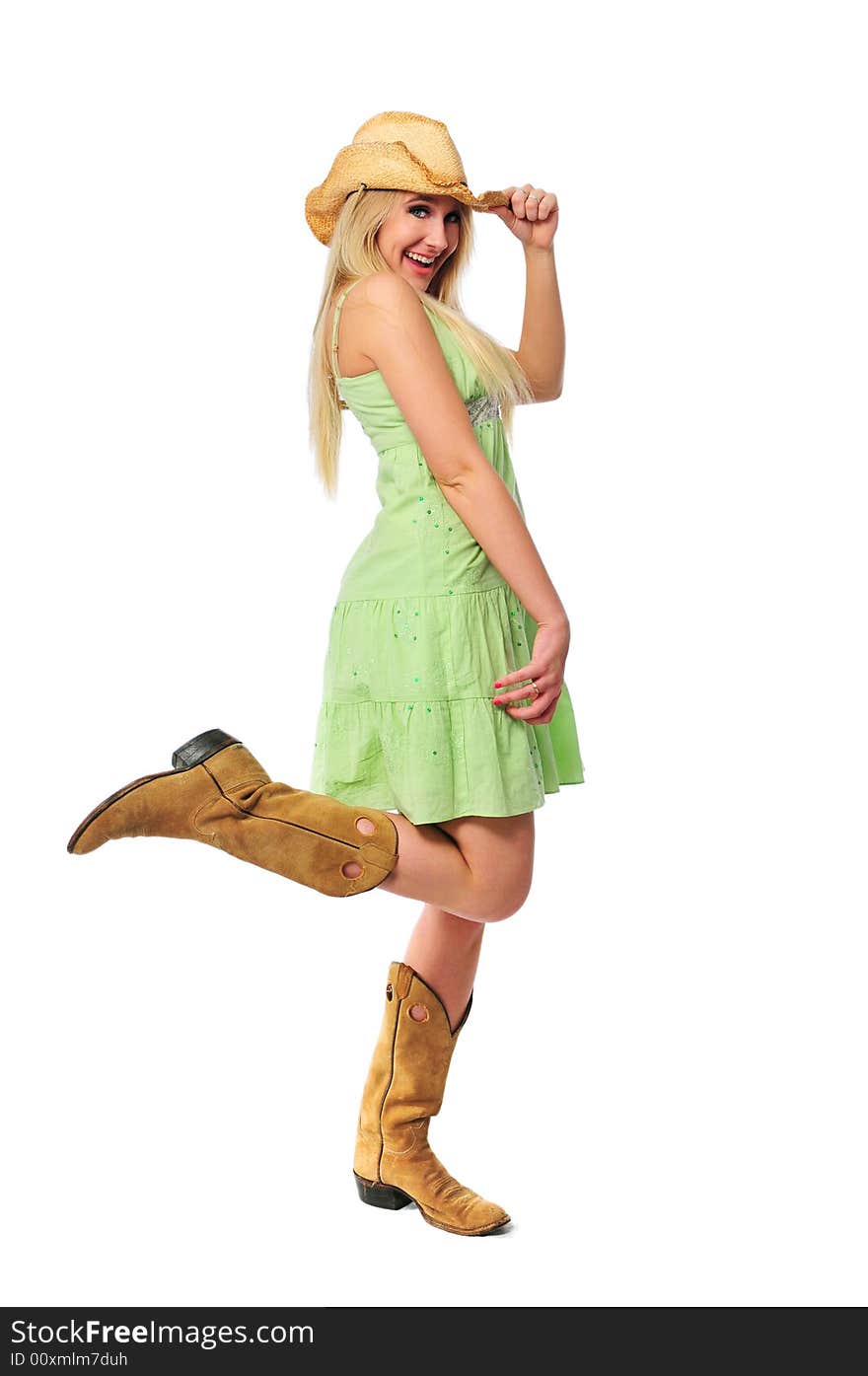 Beautiful teen girl with hat and boots isilated on white