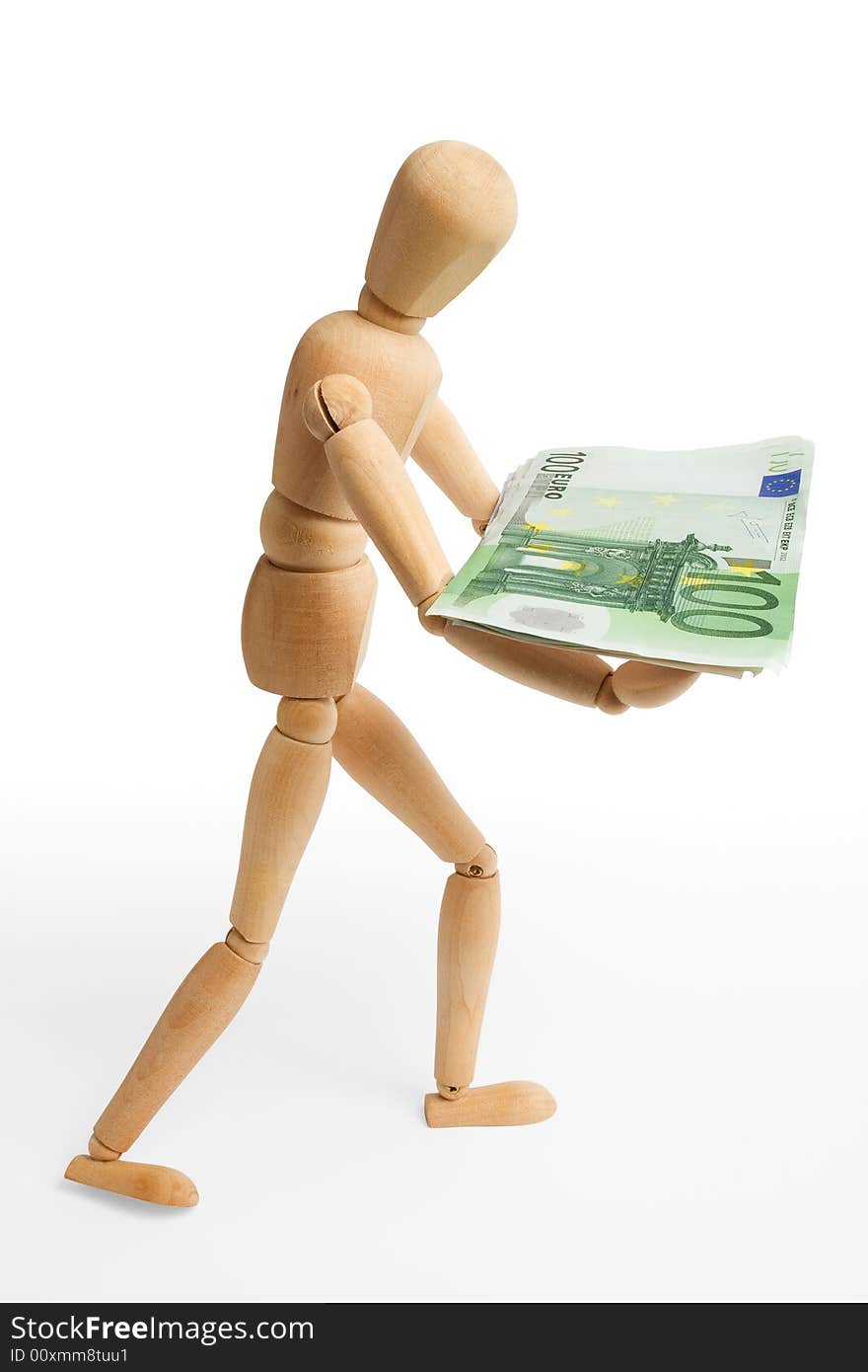 The wooden figure holds euro. Isolated on white [with clipping path]. The wooden figure holds euro. Isolated on white [with clipping path].