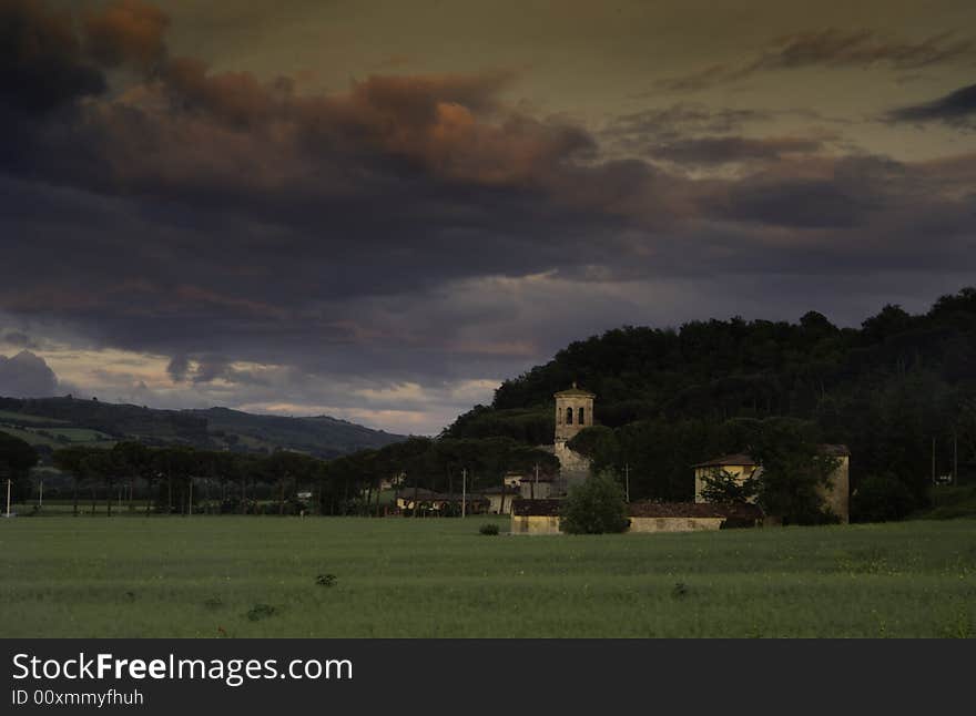 Isolated abbey in te middel of the umbrian countryside at sunset, Italy. Isolated abbey in te middel of the umbrian countryside at sunset, Italy