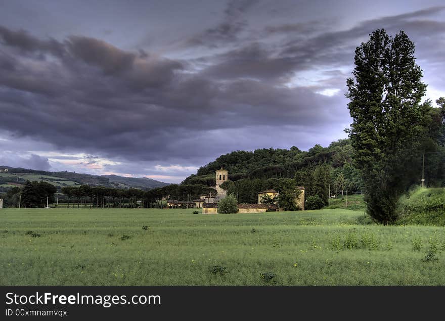 Isolated abbey in te middel of the umbrian countryside at sunset, Italy. Isolated abbey in te middel of the umbrian countryside at sunset, Italy