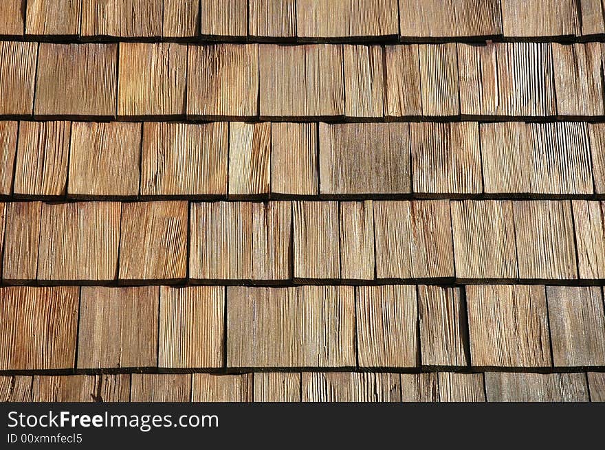 Wooden tiling on a house wall