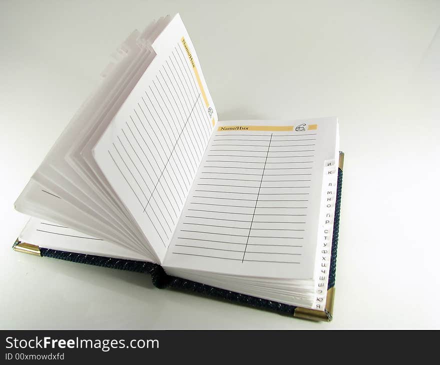 The opened notebook on a white background